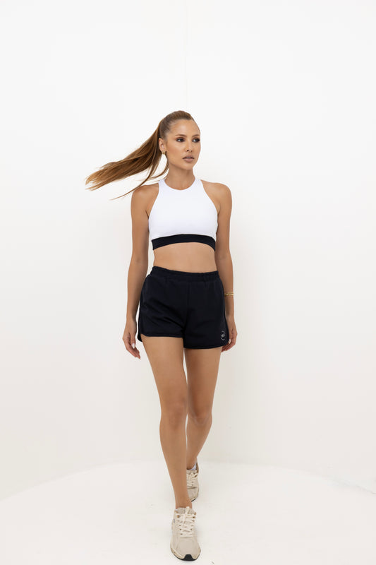 Conjunto Esportivo short com bolso e top de alça cruzada