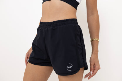 Conjunto Esportivo short com bolso e top de alça cruzada